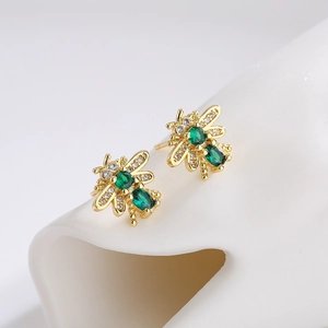 18K gold plated bee stud earrings with green gemstones and clear crystals on white stand