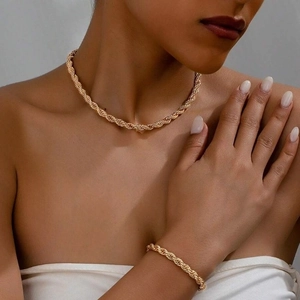 Classic gold rope chain jewelry set including minimalist necklace and bracelet for women