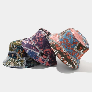 Three bohemian patchwork floral bucket hats in assorted vintage patterns and vibrant colors