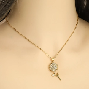 Rotating sunflower pendant necklace with zircon inlays on golden copper chain