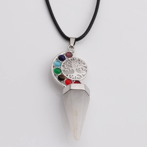 Detail of life tree chakra pendant with white hexagonal crystal and silver wire wrap