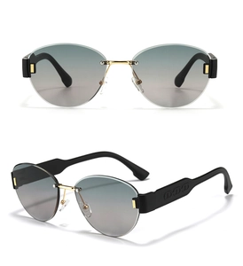 Detail view of rimless oval sunglasses with blue gradient lenses and gold bridge