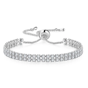 Detailed macro view of dual-row tennis bracelet with sparkling stones and adjustable bolo clasp
