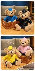 Close-up of four dressed teddy bear plush toys in colorful outfits and matching hats