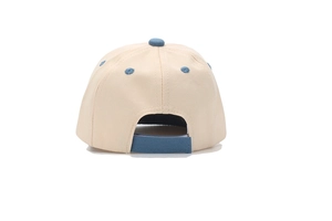 Detail view of baby baseball cap back with adjustable blue strap and beige cotton fabric