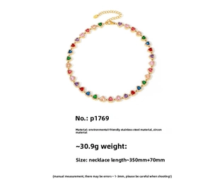Detail of heart-shaped multi-color zircon necklace in gold-plated stainless steel