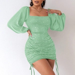 Detail of green sparkly mini dress with square neck and adjustable side drawstring ruching