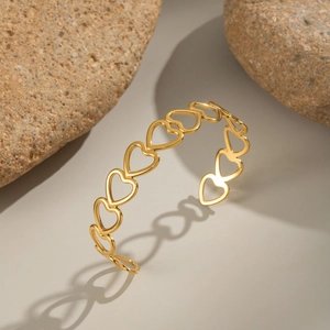 18K gold plated hollow heart open cuff bracelet made of premium stainless steel