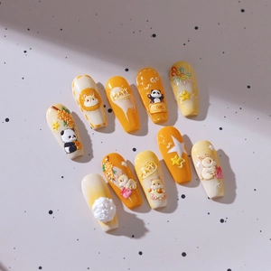 3D embossed panda and moon rabbit nail art set with vibrant orange and yellow floral patterns