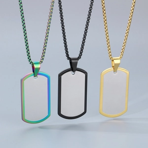 Detailed shot of rainbow, black and gold military dog tag pendants on venice chains