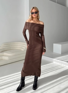 Close-up of the deep brown ribbed knit texture on an off-shoulder bodycon maxi dress