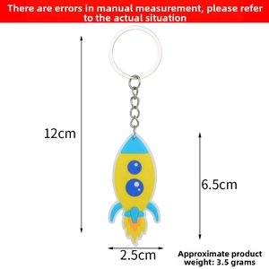 Cartoon rocket keychain dimensions and weight shown with metal ring attachment