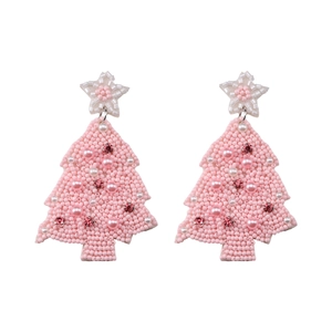 Detail of pink handmade beaded Christmas tree earrings with pearls and rhinestones