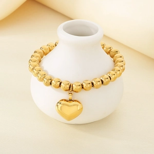 18K gold-plated stainless steel beaded bracelet with a 3D hollow heart pendant