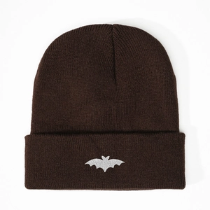 Dark brown knit beanie with silver glitter bat embroidery in a trendy gothic style