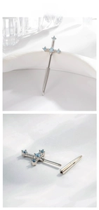 Detail of cross sword earring with blue zircon inlay and screw-back fastener design