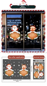 Macro view of Christmas window stickers featuring Santa, reindeer and snowflake motifs