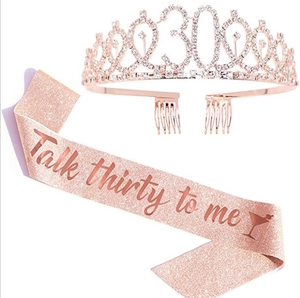 Detail of rose gold 30th birthday crown with rhinestones and glitter fabric sash