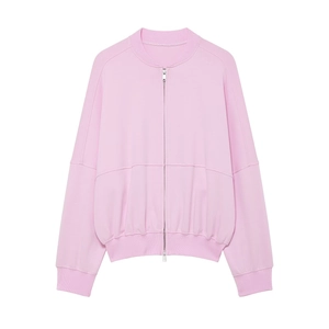 Close-up of pink zip-up jacket collar and silver zipper detail on sporty loungewear