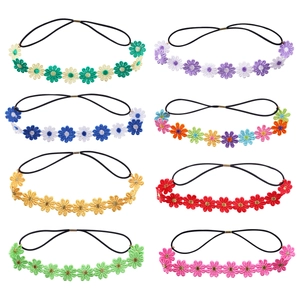 Detail of 8 multicolor daisy flower headbands with elastic bands on a white background