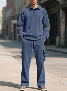 Detail of blue corduroy long sleeve polo and cargo pants set with elbow patch textures