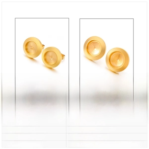 Macro detail of 13mm and 19mm gold stainless steel earring studs with gem settings
