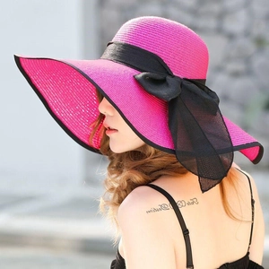 Chic rose red straw sun hat with large brim and black ribbon bow for summer beach