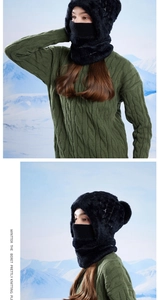 Detail of black plush winter hat with integrated face mask and neck gaiter for outdoor warmth