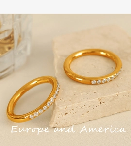 Detail of gold crystal rings on stone with premium jewelry craftsmanship