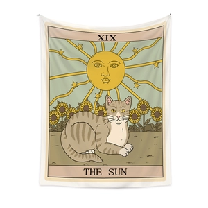 Detail of The Sun tarot tapestry featuring a grey cat, sunflower, and vintage sun design