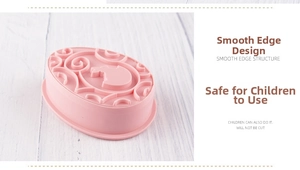 Detail of pink Easter bunny cookie mold with smooth edges for child-safe baking