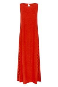 Detail view of red sleeveless linen dress with scalloped trim and back button closure