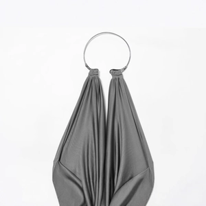 Silver grey pleated halter dress featuring a minimalist metallic neck ring ornament