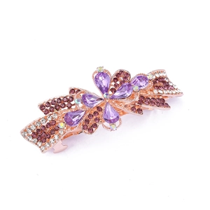 Detailed view of alloy spring hair clip with purple crystal bow and rose gold plating