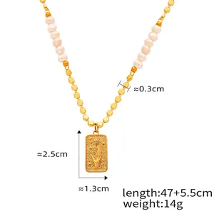 Detail of vintage gold bead necklace with freshwater pearl and embossed palm star pendant