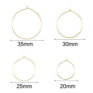Gold round wine glass charm rings in four sizes 20mm 25mm 30mm and 35mm diameter