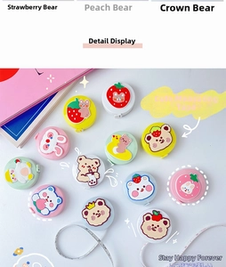 Macro view of animal-shaped retractable mini soft tape measures in diverse pastel colors