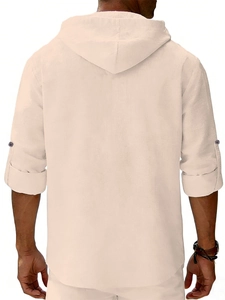 Detail of men's linen hooded shirt back view showing texture and adjustable sleeve tab