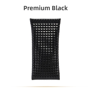 Detailed view of the geometric 3D puzzle pattern on premium black PU leather glasses pouch