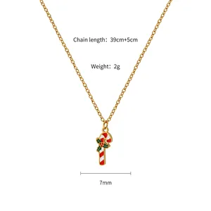 Close-up of candy cane pendant with holly leaf on a 39cm gold titanium steel chain