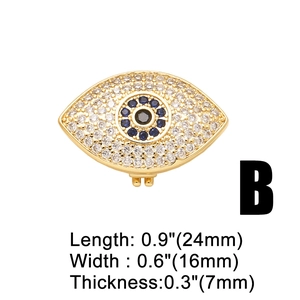 Macro view showing dimensions of golden evil eye charm with blue and white zircons
