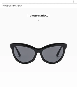 Detailed view of glossy black cat eye sunglasses with dark gray lenses in high quality