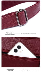 Detail of burgundy lychee leather bag with adjustable strap buckle and back zipper pocket