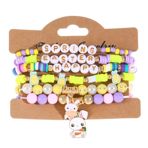 Detail of Easter bead bracelet set featuring bunny charms and Happy Spring letter beads
