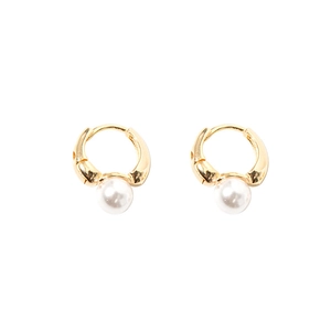 Detail shot of elegant gold-tone hoops with round white pearls on white background