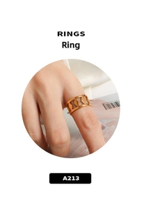 Detailed view of a wide 18k gold plated stainless steel ring with hollow geometric patterns