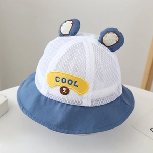 Detail of baby sun hat with breathable blue and white mesh, 3D ears and COOL embroidery