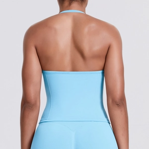 Close-up of seamless light blue backless sports tank top with slim straps and athletic fit