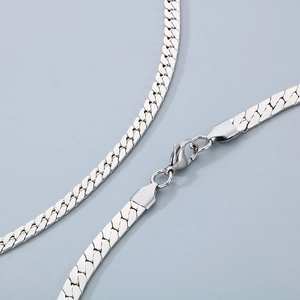 Polished silver Cuban link chain necklace with lobster clasp in a flat snake-like structure