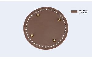 Detail of 15cm dark khaki round DIY bucket bag base with pre-drilled holes and gold studs